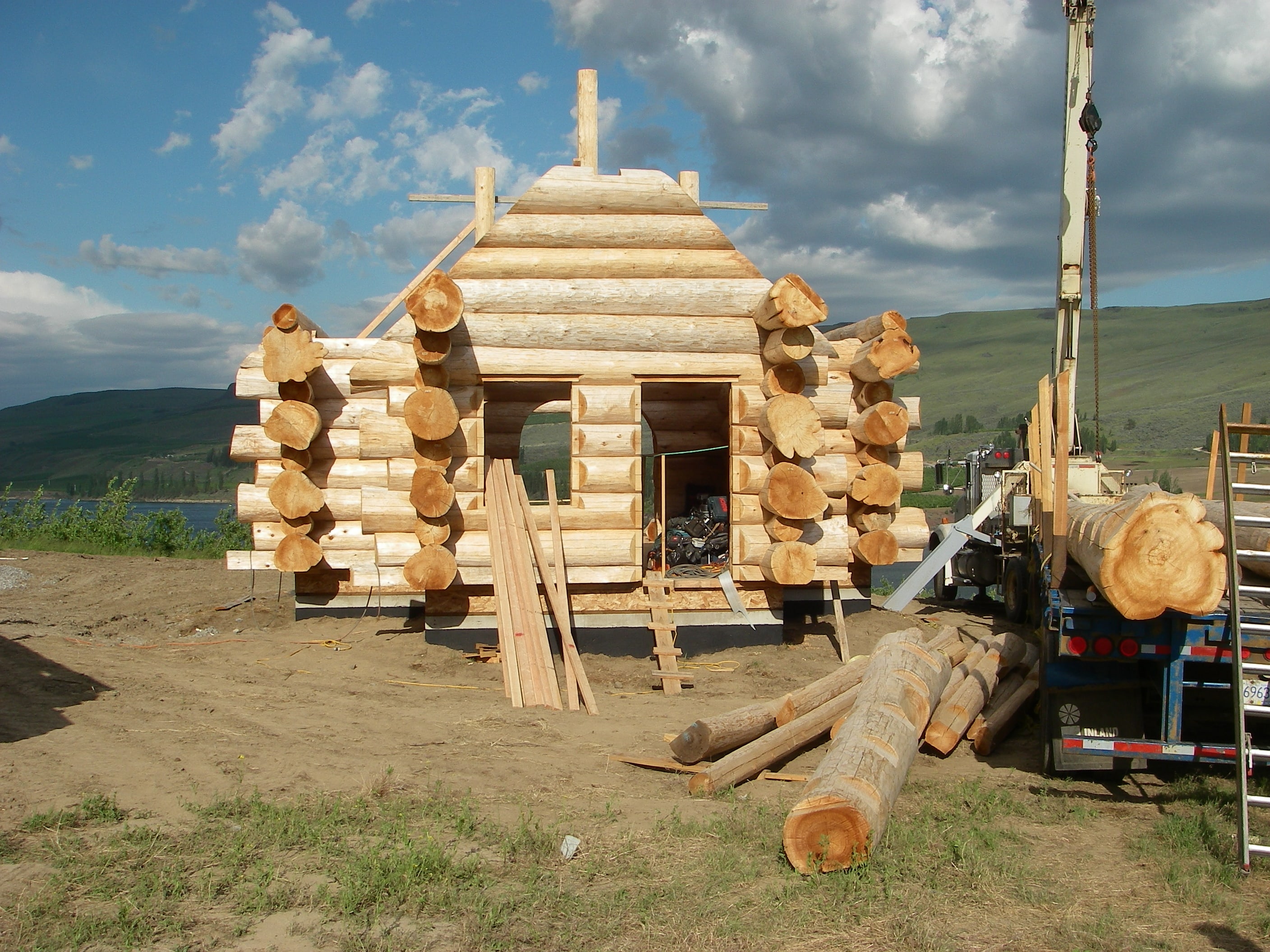 Front view of a log home construction in progress